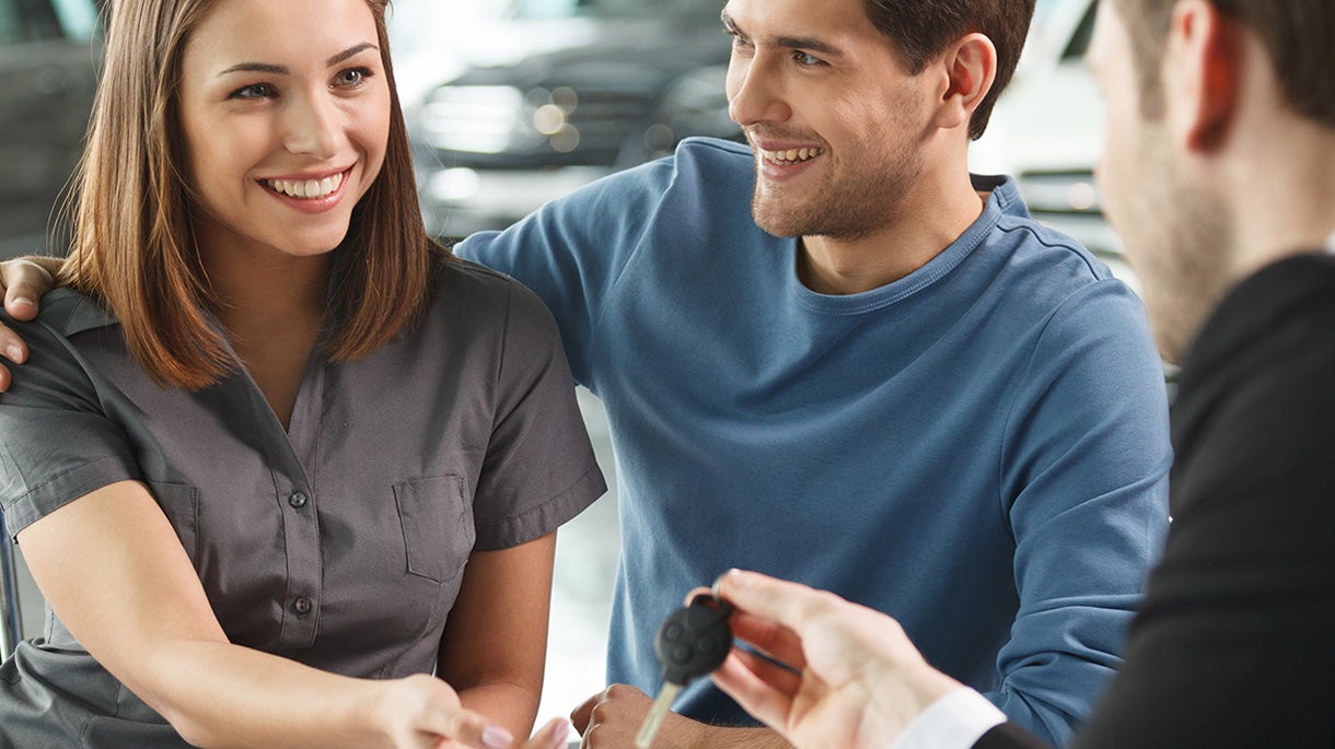 couple financing car Clint Newell Chevrolet in Roseburg OR