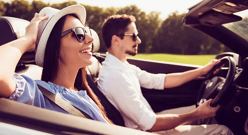 couple in car Clint Newell Chevrolet in Roseburg OR